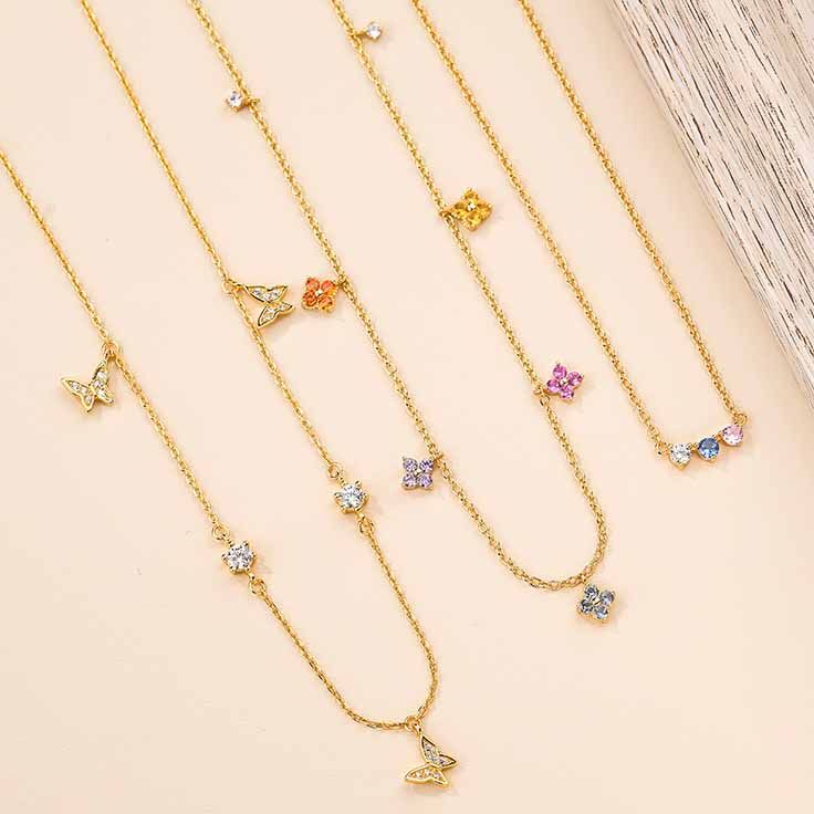 Whimsical Charm Station Necklace Collection